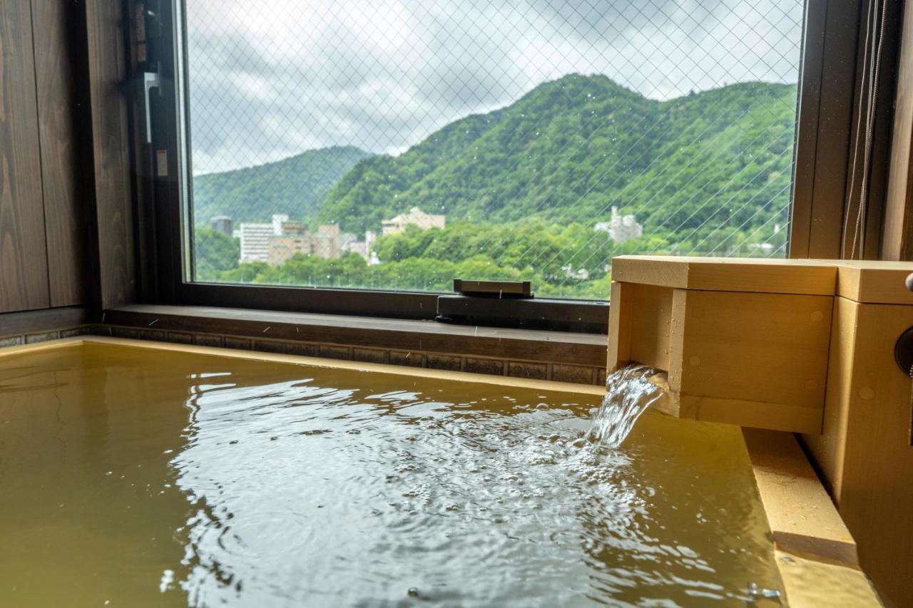 Готель Jozankei Onsen Yurakusoan Саппоро Екстер'єр фото